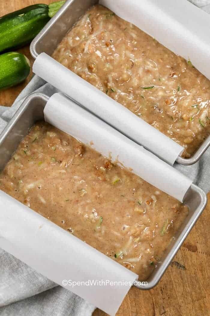 Two loaf pans of Zucchini Bread mix ready to go into the oven