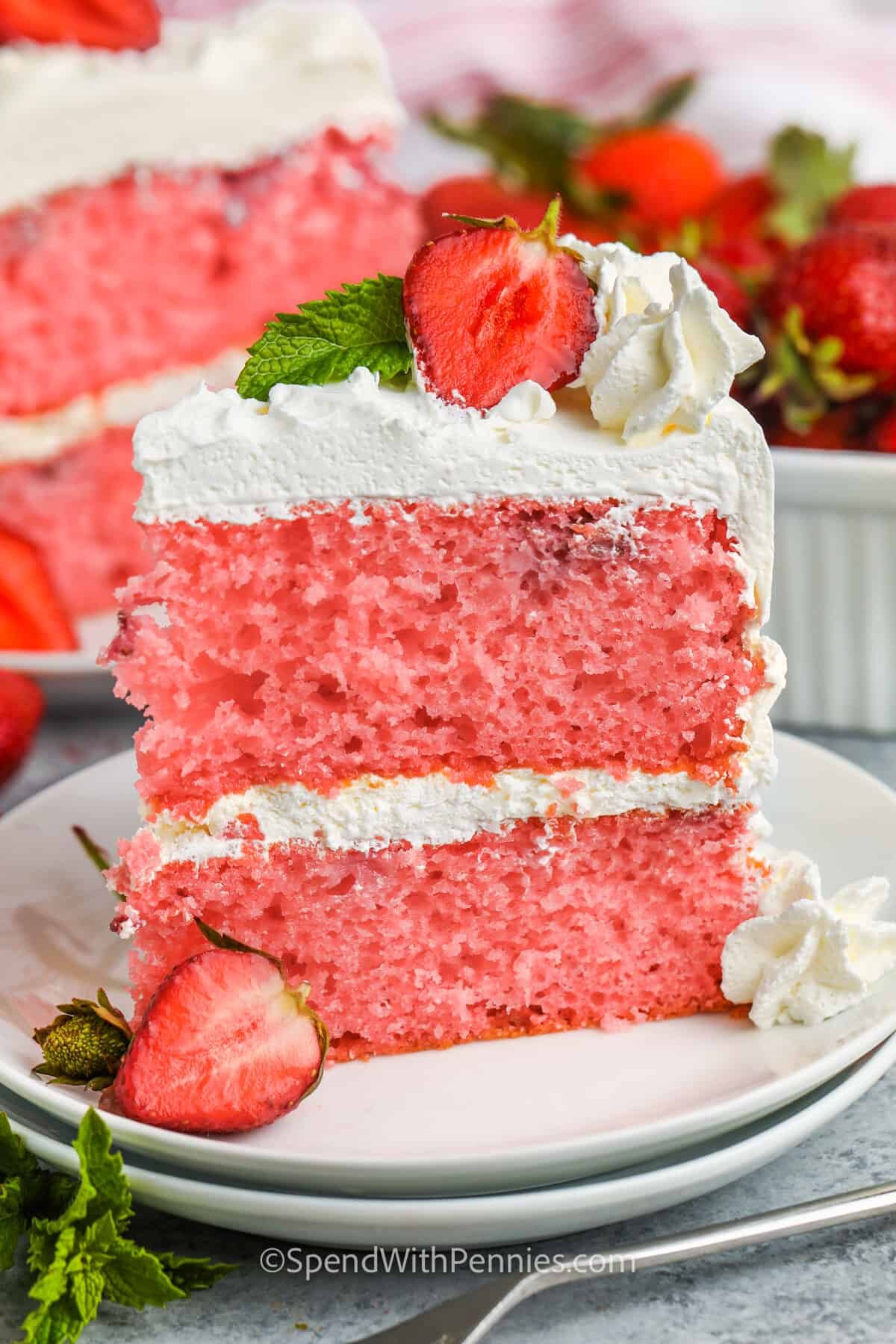 Strawberry Cream Cake with whipped topping and fresh strawberries 