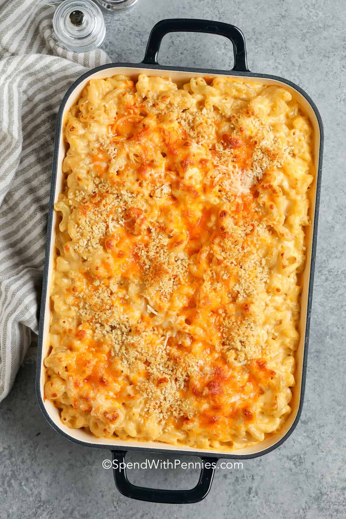 a pan of baked mac and cheese with a bread crumb and cheese topping