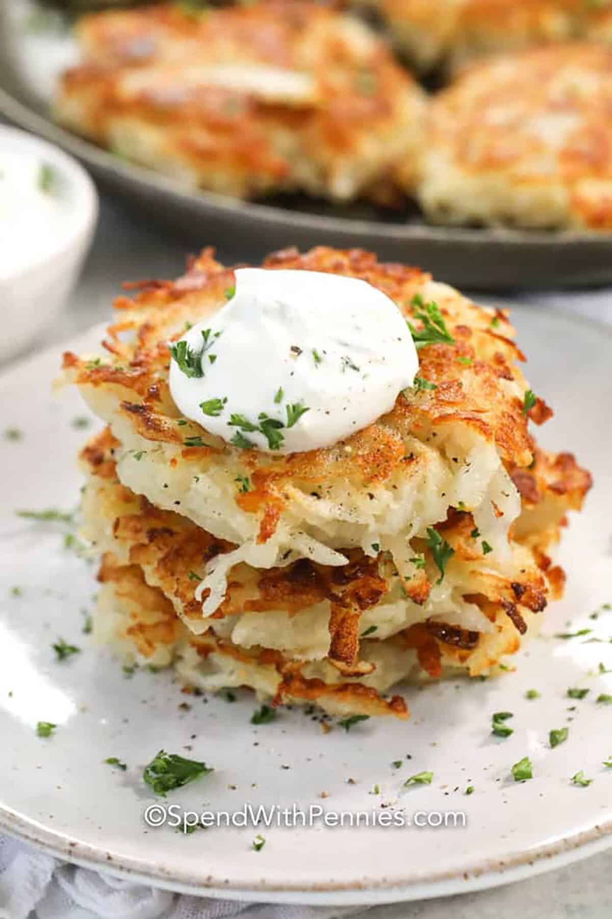 plated Potato Pancakes with sour cream