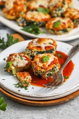 plated Zucchini Parmesan with a fork